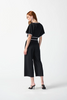 Image of Joseph Ribkoff Butterfly Sleeve Belted Contrast Piping Cropped Culotte Jumpsuit - Black/Vanilla *Take 35% Off*