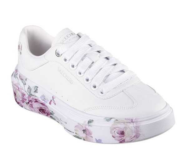 White skechers with sales flowers