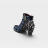 Image of L'Artiste Dessalynn Floral Suede Ankle Boot - Navy Multi