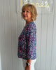 Image of Lulu-B V-Neck Animal Print 3/4 Sleeve Top - Multicolor