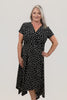 Image of Steven Guy Plus Size Surplice Neckline Short Sleeve Handkerchief Hem Dotted Dress - Black/Vanilla