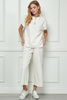 Image of See and Be Seen Short Dolman Sleeve Textured Quarter Zip Top - Cream