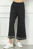 Image of See and Be Seen Pearl Embellished Textured Knit Wide Leg Crop Pant - Black