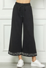 Image of See and Be Seen Pearl Embellished Textured Knit Wide Leg Crop Pant - Black