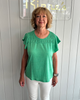Image of Steven Guy Flutter Sleeve Smocked Front Knit Top - Apple Green