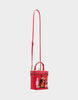 Image of Betsey Johnson Cozy Up Light-Up Fireplace Bag - Red